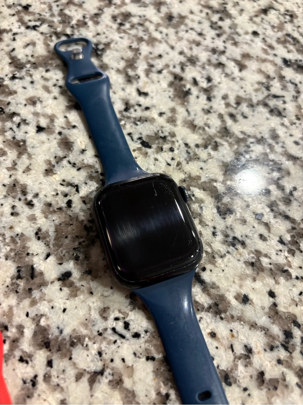 Apple Watch with Navy Case and White/Black, Green, and Red Sport Bands